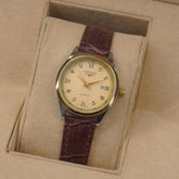 Woman Silver-Golden Dial Watch with Brown Straps