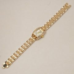 Woman's Golden Chain Watch with white dial