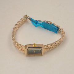 Woman's Golden Chain Watch with green dial