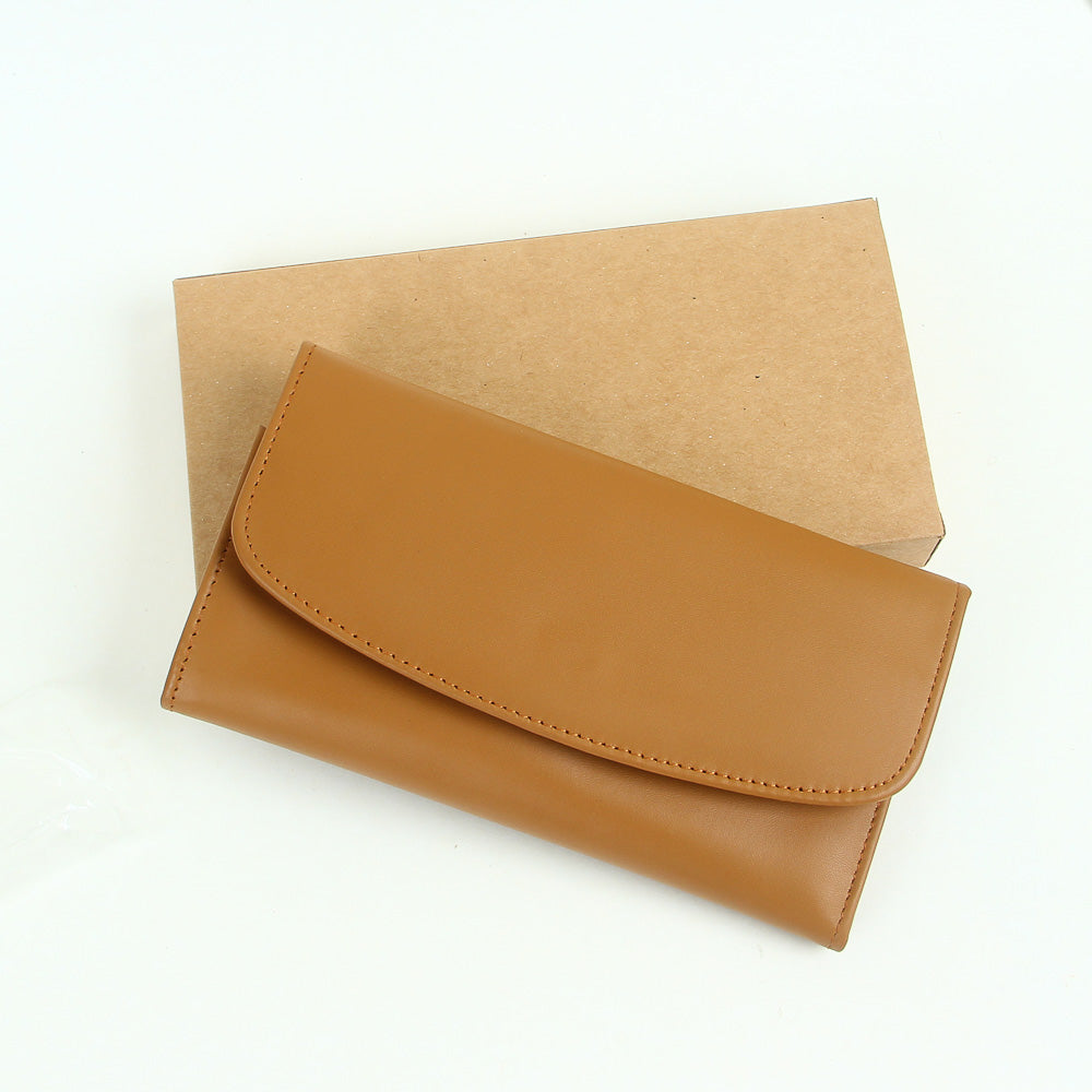 Woman's genuine leather purse beige with button lock