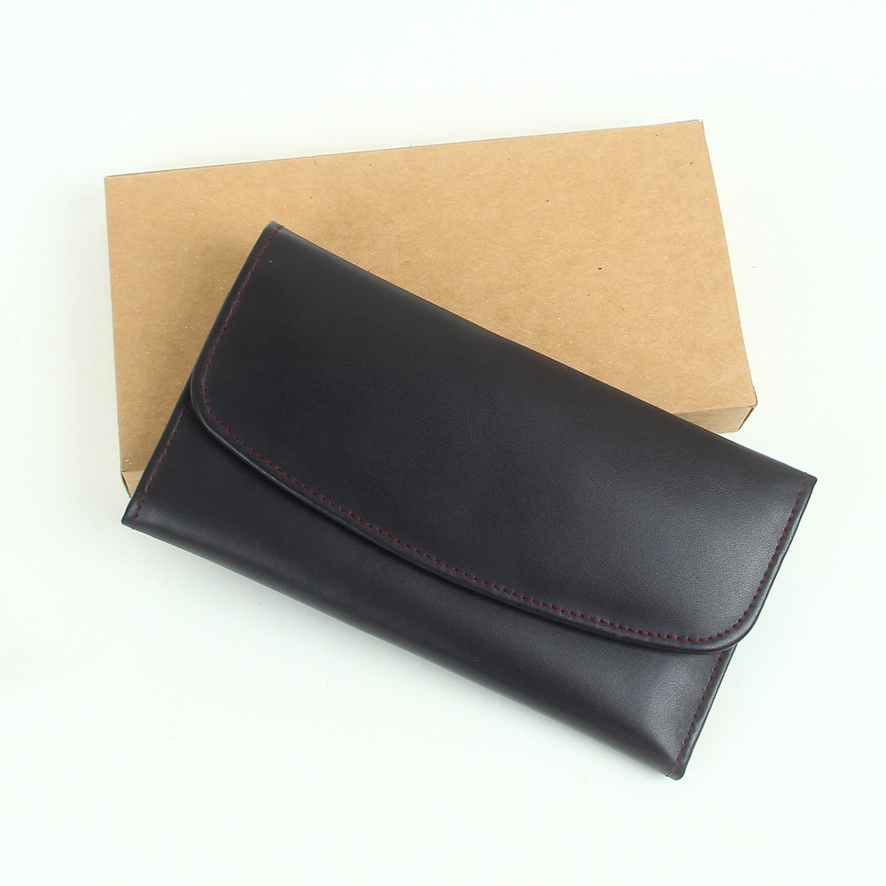 Woman's genuine leather purse coffee color with button lock