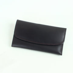 Woman's genuine leather purse coffee color with button lock