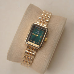 Woman's Golden Chain Watch with green dial
